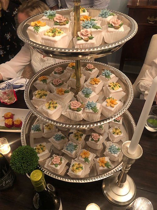 Pastries on a 3-tier silver serving trey